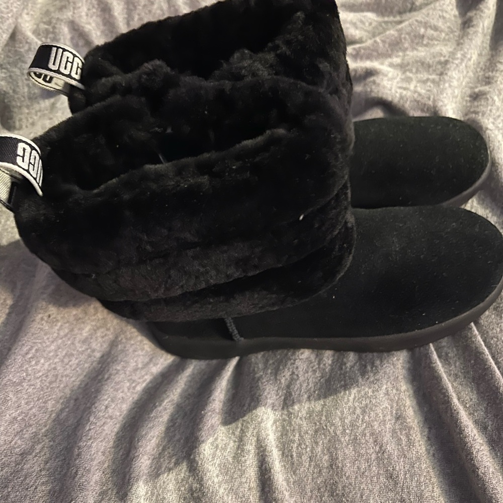 Girls black Uggs boots